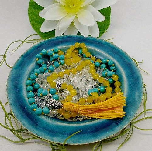 Bild "Reinigen Aufladen:Teller-tuerkis-Om-Mala-Reinigung-Bergkristall-500_ji.jpg"